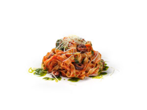 Tagliatelle with puttanesca sauce, parsley oil